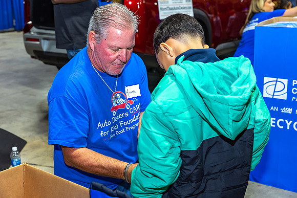 Coat giveaway2023Auto Dealers Ass__0151
